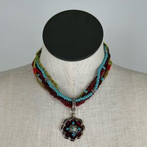 Avon Costume jewelry statement necklace with glass floral pendant